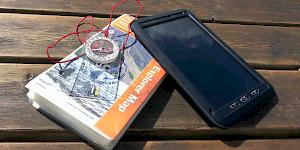 Picture showing an OS Explorer active map for the Lake District with a Silva Explorer 4 Compass and a tablet in its rugged case.