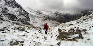 Picture of the author descending a snow dusted and deserted Moel Hebog in western Snowdonia.