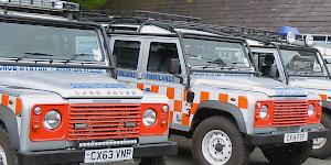 Image of the Llanberis Mountain Rescue Team Landrovers parked up outside of their base in Nant Peris.