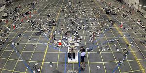 Picture showing the debris from the 2003 Columbia Shuttle disaster laid out in a hangar during investigation.